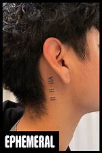 Roman Numeral Tattoos Behind the Ear